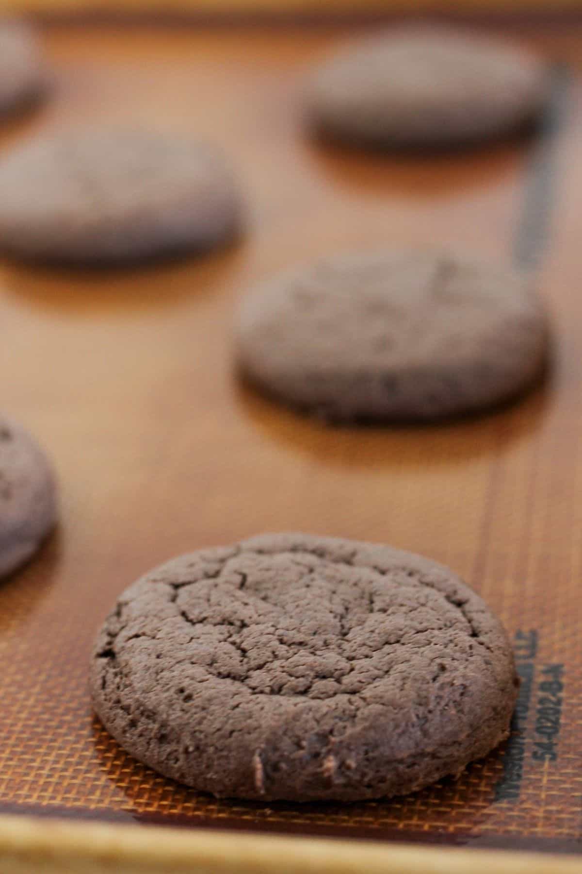 Baked chocolate cake mix cookies.