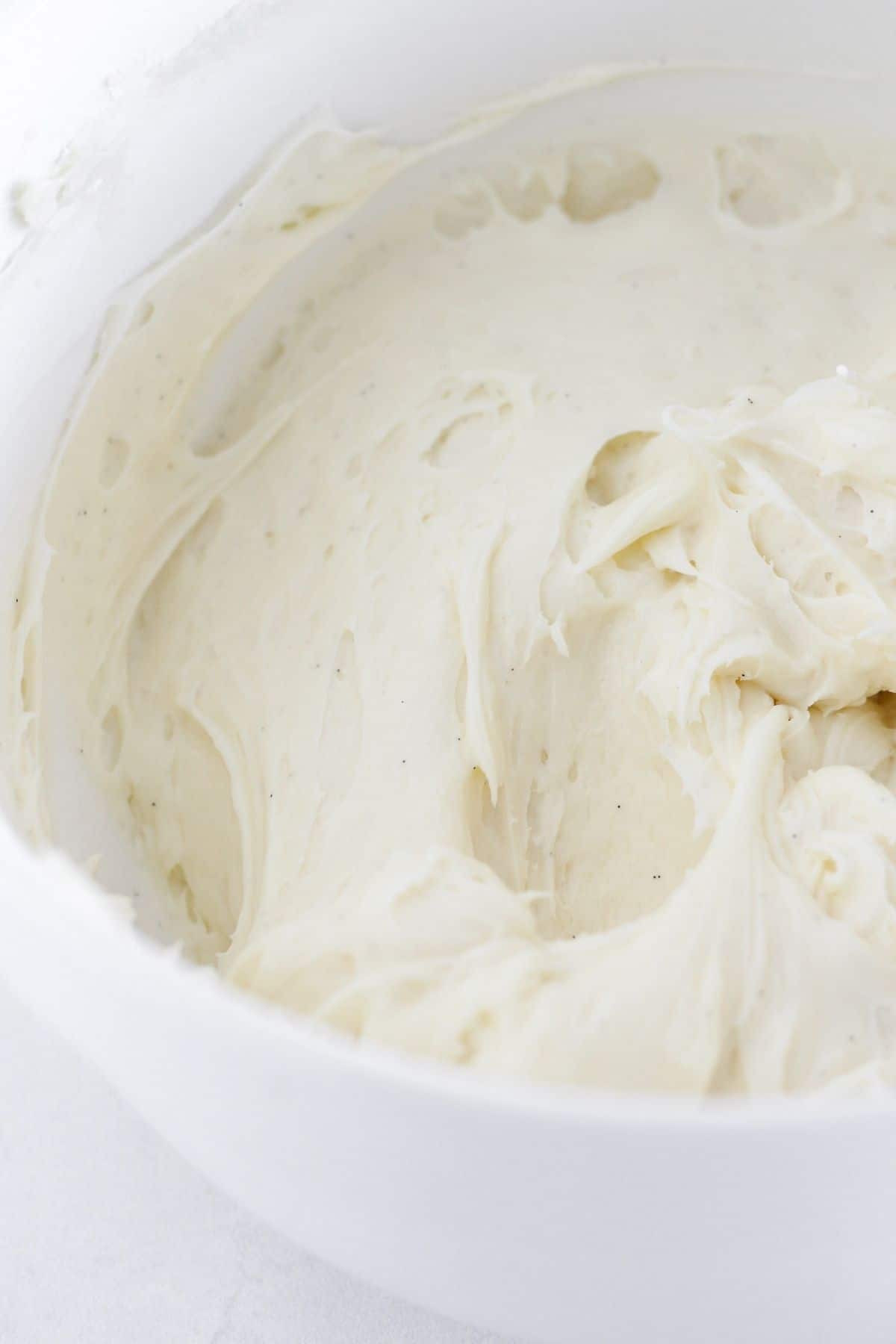 Making the cream cheese frosting.