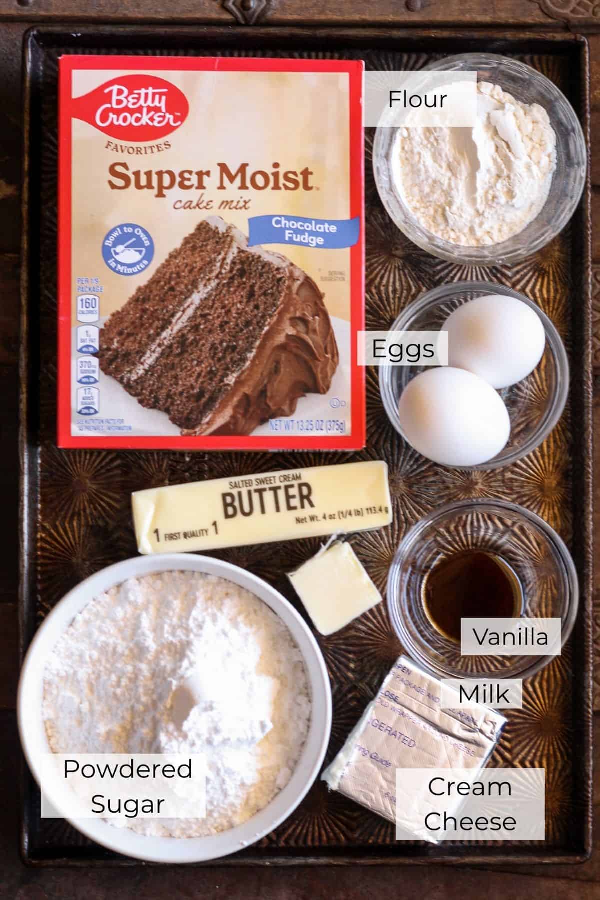 The ingredients to make chocolate sandwich cookies with a cake mix.