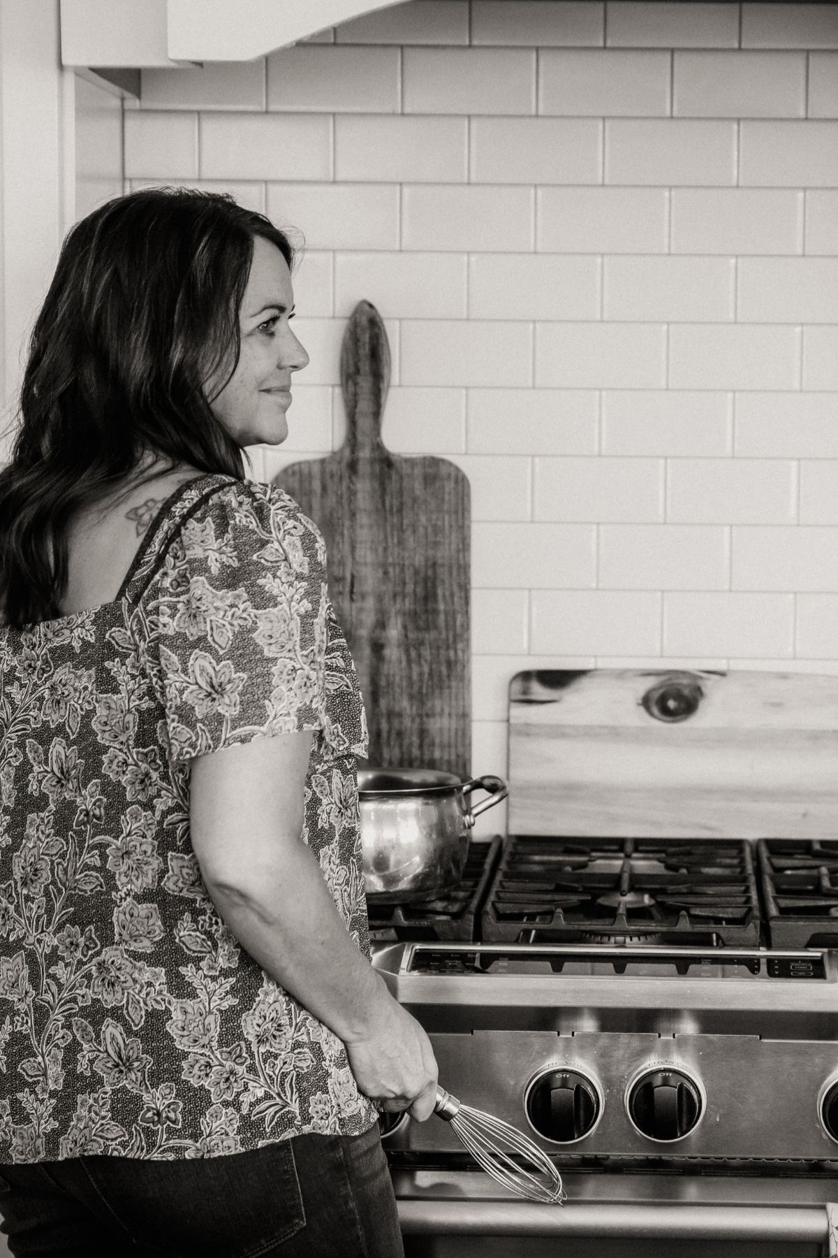 Making dinner at the stove.
