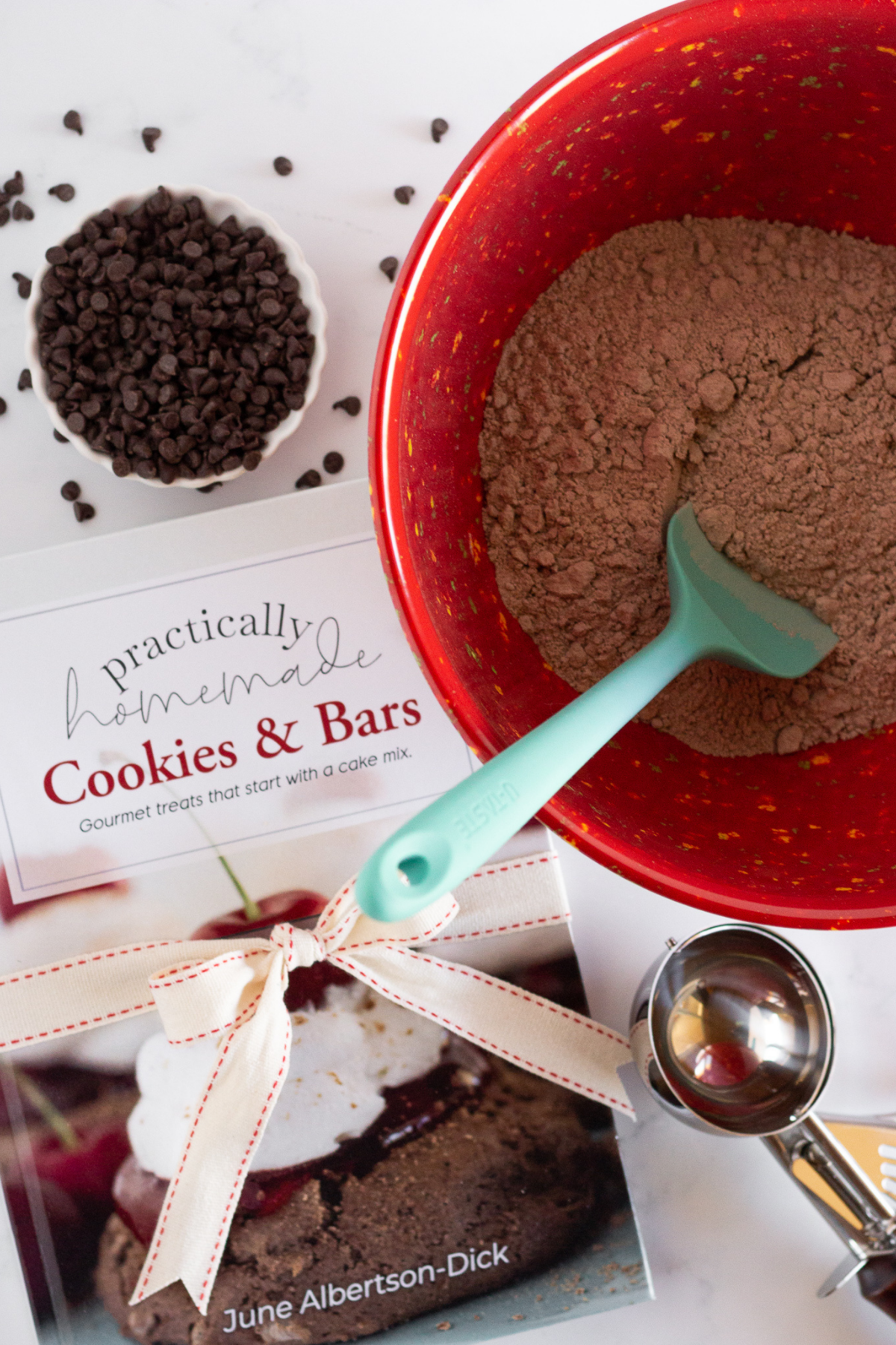 Making cookies with a cake mix from cookbook.