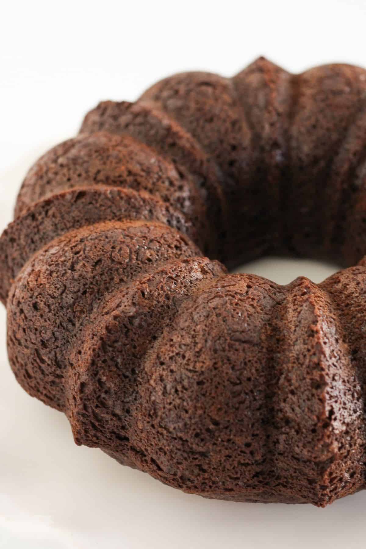 A bundt cake that is chocolate cooling.
