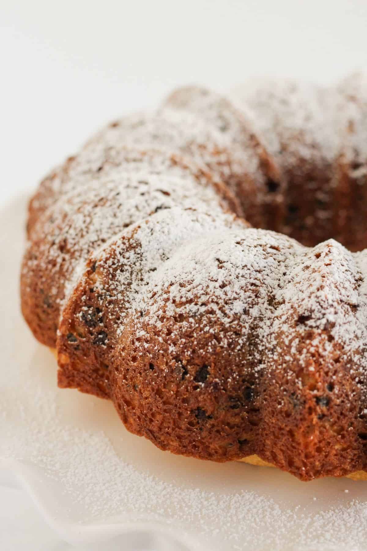 Chocolate chip bundt cake with powdered sugar.