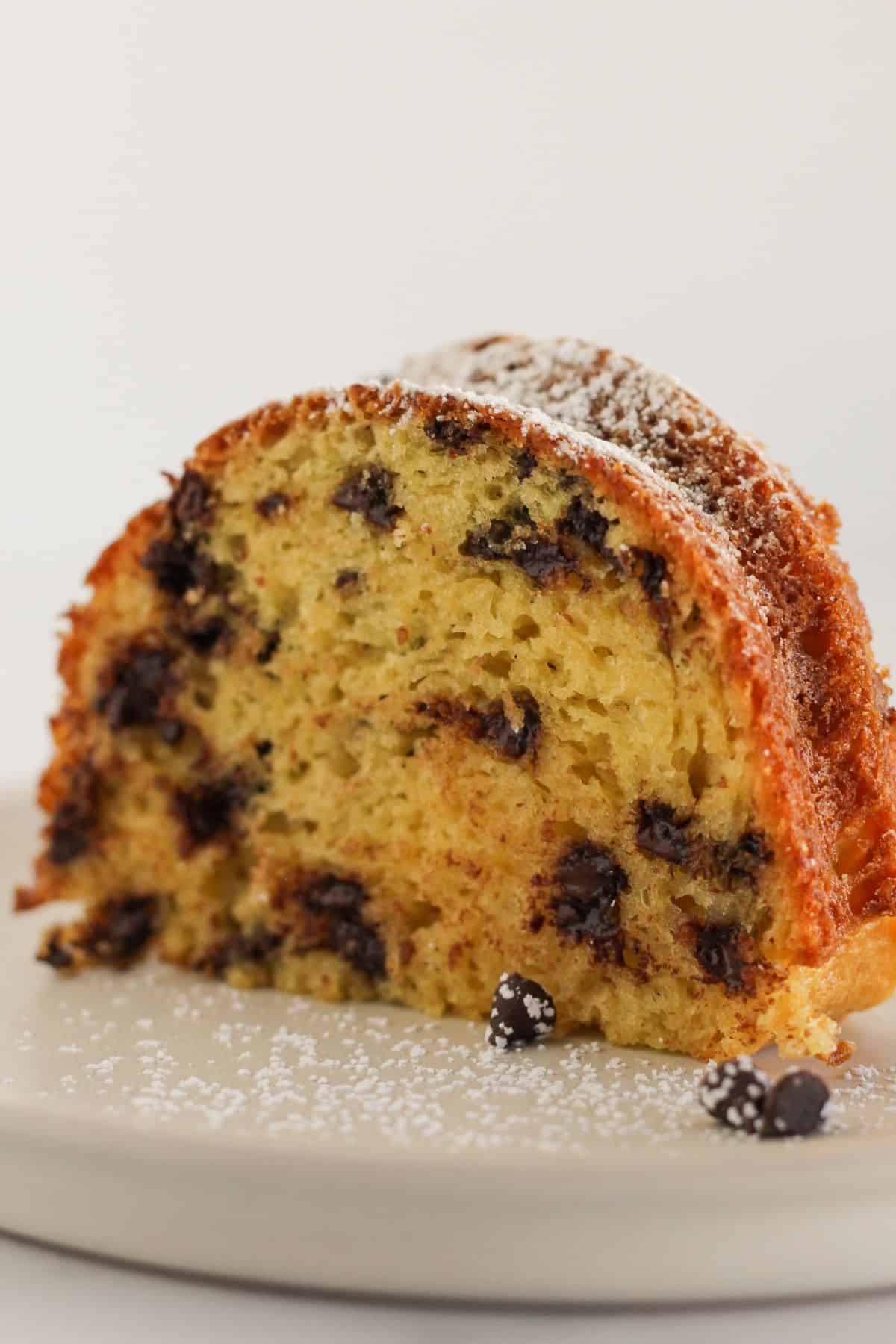 A slice of chocolate chip bundt cake.