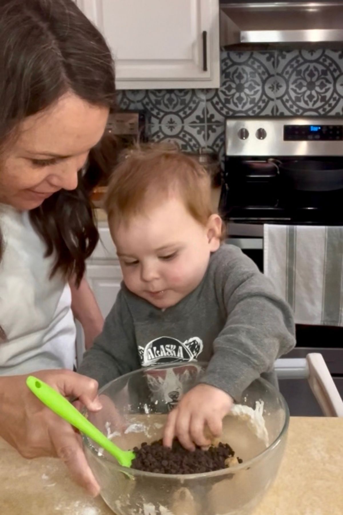 Baking chocolate chip cookies with my grandson.