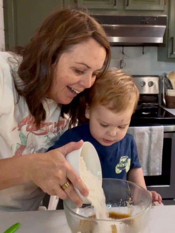 Grammy and Elliott making cookies.